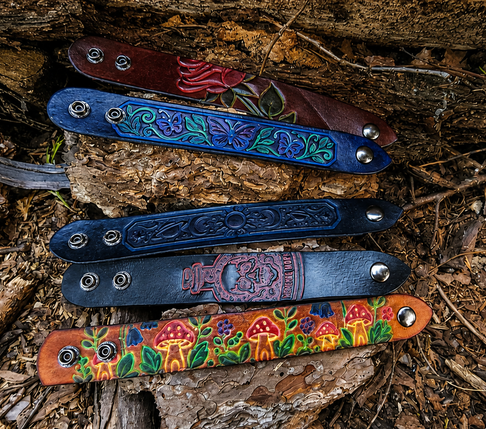 Leather bracelet run by Horizon Creations laid out outdoors on bark